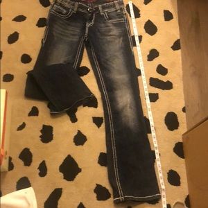Rock & Roll cowgirl riding jeans
